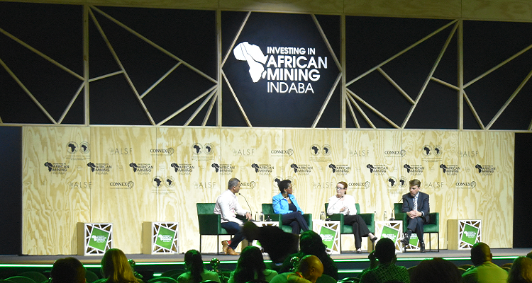 An image of speakers on stage and discussion at Mining Indaba 2023. 