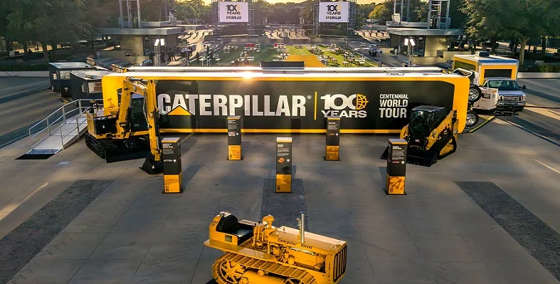 The celebrations of Caterpillar with banners and equipment on display.