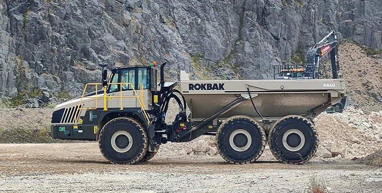 A side-on shot of a Rokbak RA40 hauler in a quarry. 