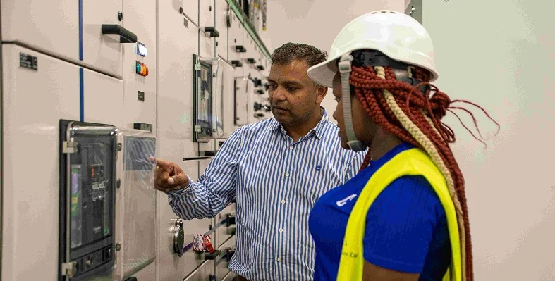 Two technicians expecting the data centre in Kenya