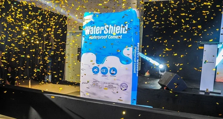 The unveiling of the WaterShield Cement with confetti falling around it.