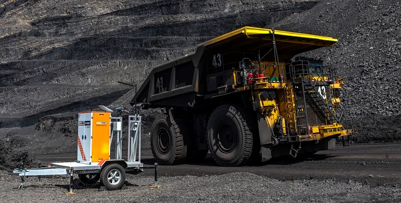 The KalPRO TireSight solution next to a large mining truck. 