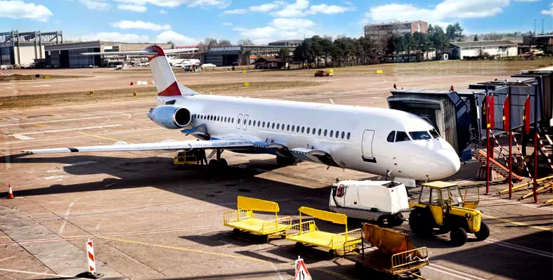 An_airplane_being_loaded_in_an_airport