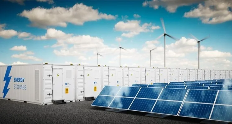 Solar panels and wind turbines connected to energy storage