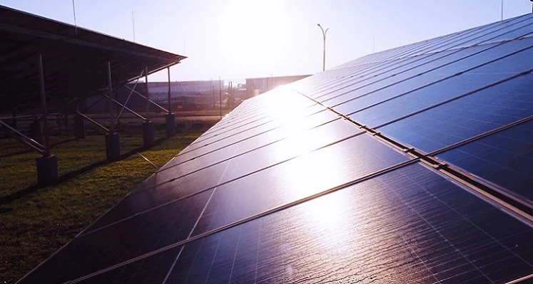 Light reflecting off of a panel at a solar farm.