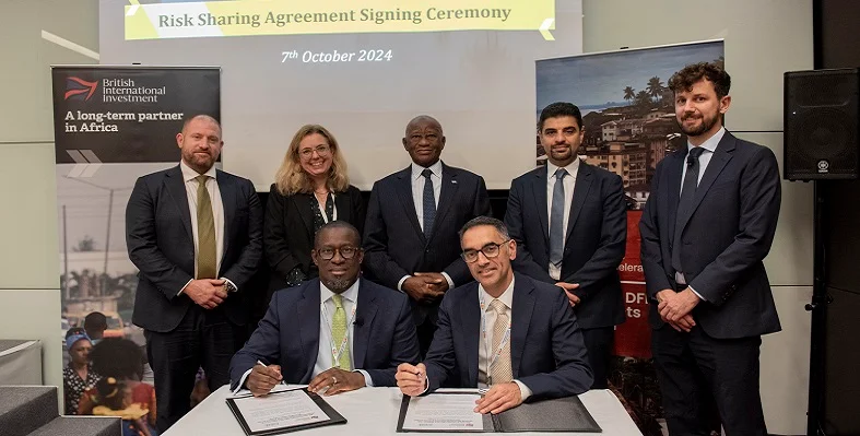 Leaders of BII and Ecobank at the signing ceremony. 