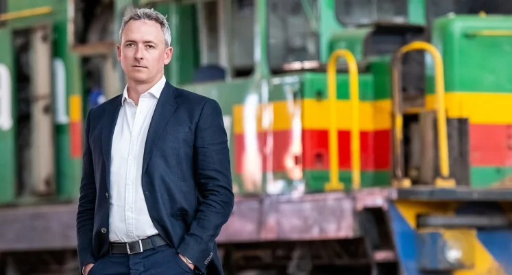 Image_of_James_Holley_with_locomotive_on_the_background