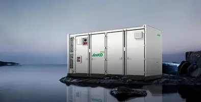 A Jinko Solar ESS storage solution on a outcrop of rocks on water.