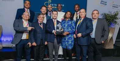 The AGL team posing for a picture with their award.
