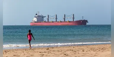 beach-girl-ship-tanker-sea