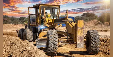 yellow-grader-construction-site-africa