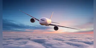 commercial-airplane-jetliner-flying-above-clouds