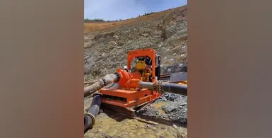orange-Godwin-pump-pipes-rocks-quarry