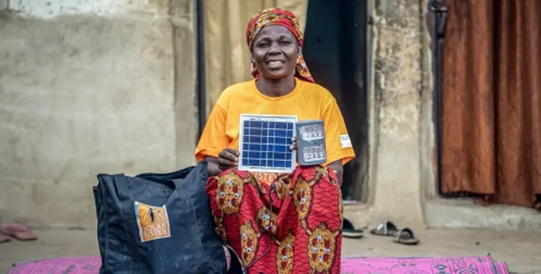 Solar Sister Entrepreneur Naomi John with her Business Kit. (Image source: Solar Sister) 191210 Bauchi 104 2