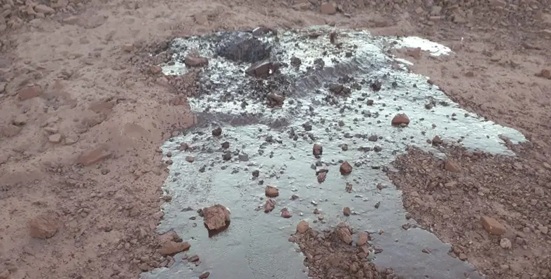 Decomposed emulsion and water. 