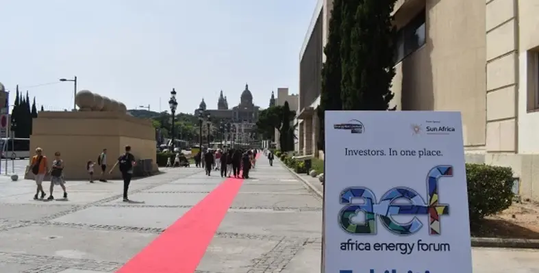 A picture of an aef stand with logo outside of the conference hall.