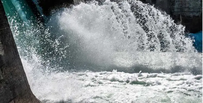 Water cascading down from a hydropower plant. 