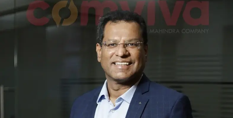 A headshot of Rajesh Chandiramani with the Comviva logo in the background. 