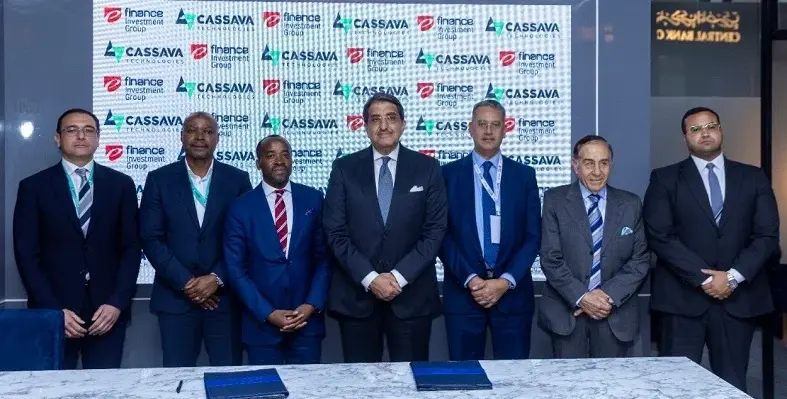 Key stakeholders from both organisations posing for a picture after signing the agreement.