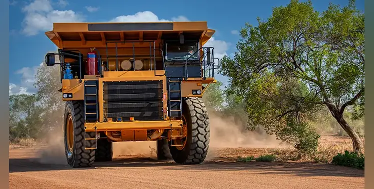 mining-truck-driving-on-dirt-road