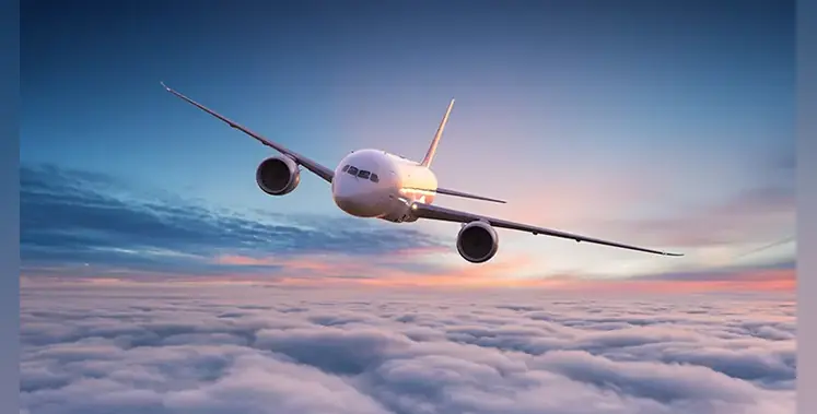 commercial-airplane-jetliner-flying-above-clouds