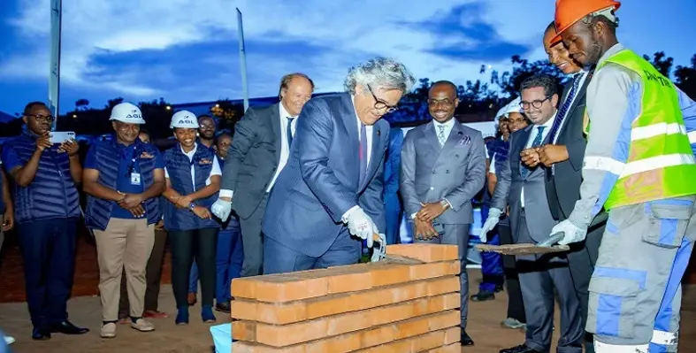The foundation stones of the new warehouse extension being laid. 