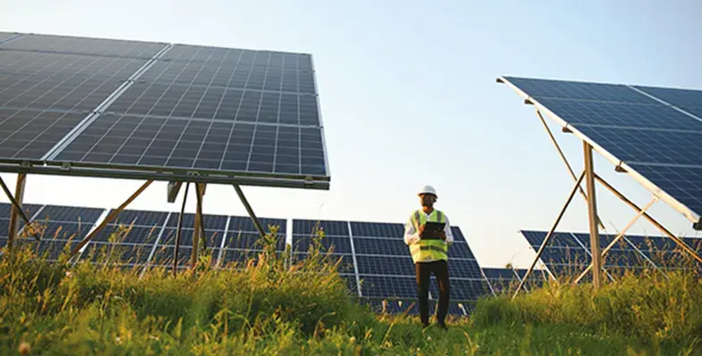 Solar_panel_technician_at_work