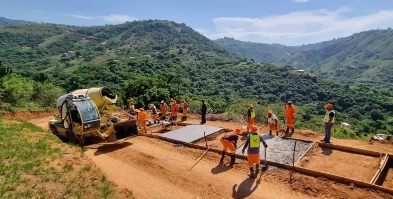 The Carmix equipment and team pouring concrete for the road in South Africa.