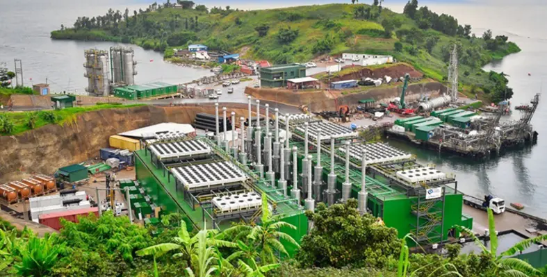 A wide shot of the power plant on Lake Kivu. 