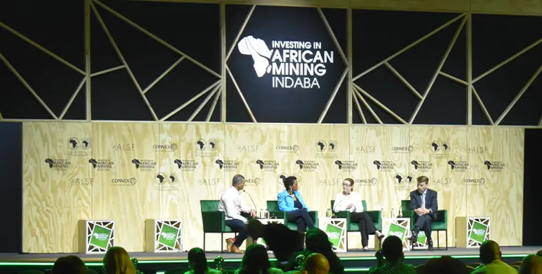 An image of speakers on stage and discussion at Mining Indaba 2023. 