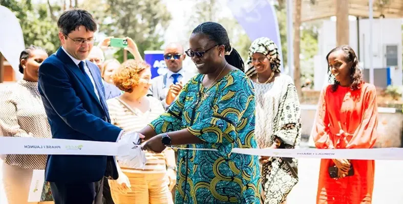 Jeanne d'Arc Mujawamariya opening the facility alongside David Hill. 