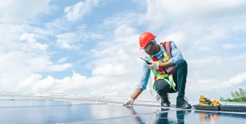 Man_working_solar_panel